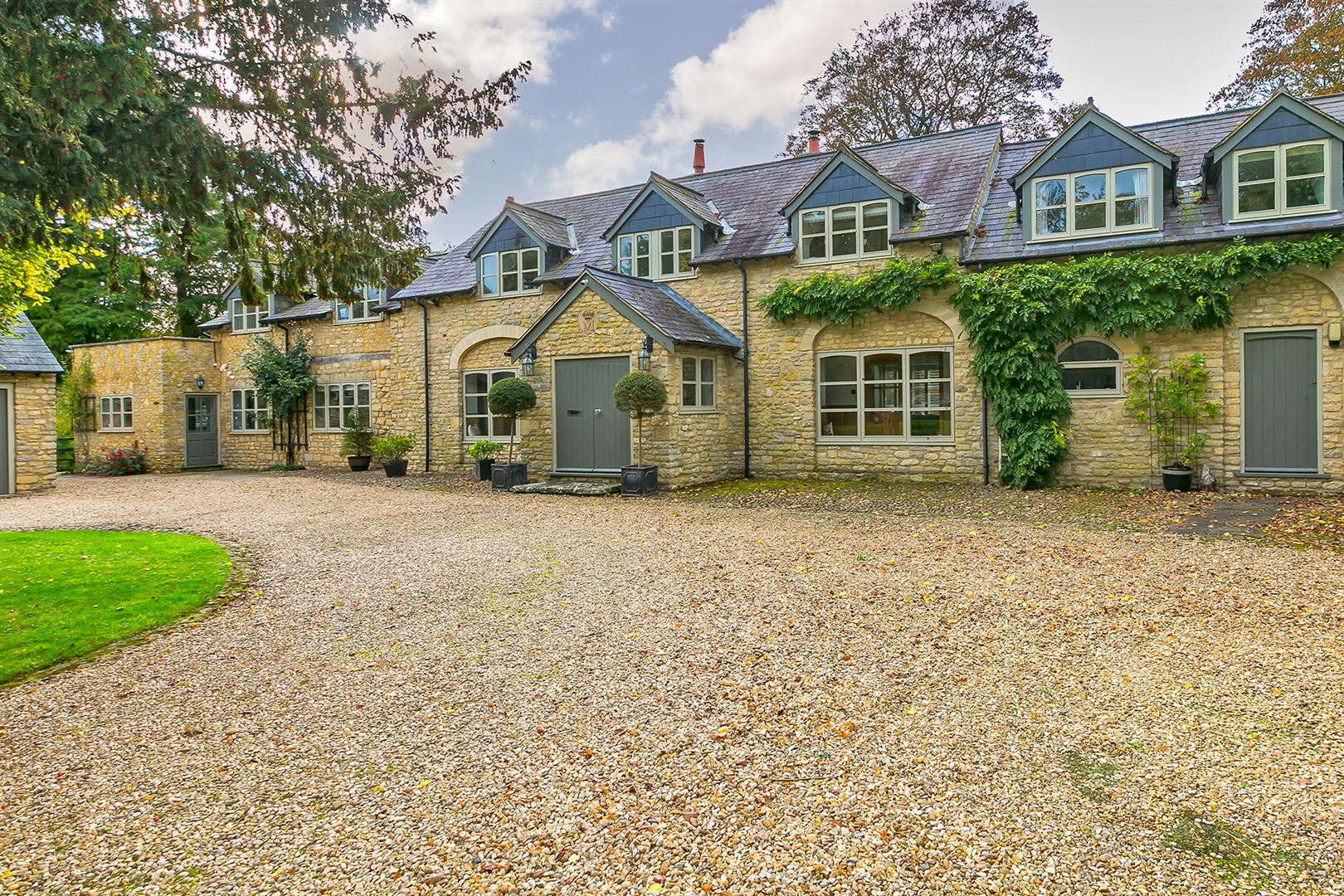 The Dovecote gets its name from the Grade II Listed medieval stone Dovecote within the grounds which was the original Dovecote to Passenham Manor. This has been skilfully converted to a three roomed annexe. The main house is a conversion of a more recent